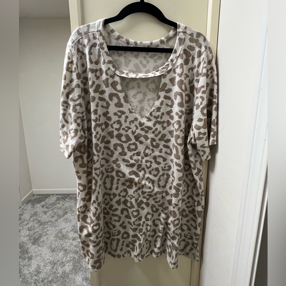 White and beige cheetah print top